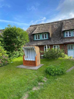 Ferienwohnung im Friesenhaus mit Meerblick